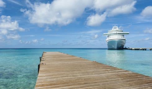 Tourguide auf einem Kreuzfahrtschiff