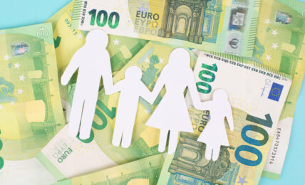 Basic child benefit, family and money, Euro banknotes, new regulation against poverty in Germany, social issue